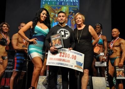 Picture of Javier Valladarez winning trainers award. $200